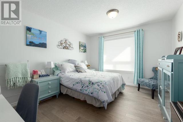 408, - 128 Centre Avenue, Condo with 2 bedrooms, 2 bathrooms and 1 parking in Cochrane AB | Image 21