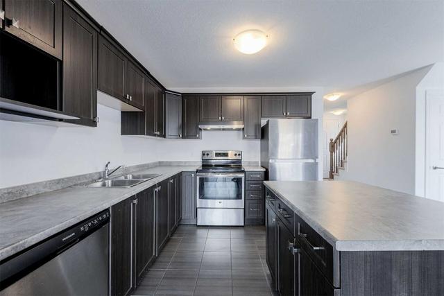 65 - 124 Parkinson Cres, House attached with 3 bedrooms, 3 bathrooms and 2 parking in Orangeville ON | Image 6
