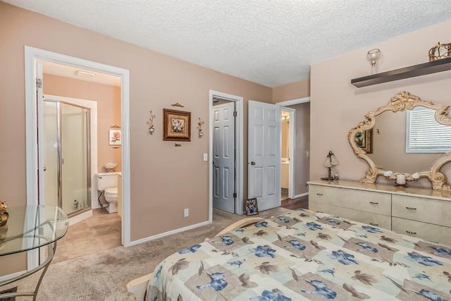 19 Millrose Place Sw, Home with 3 bedrooms, 2 bathrooms and 2 parking in Calgary AB | Image 18