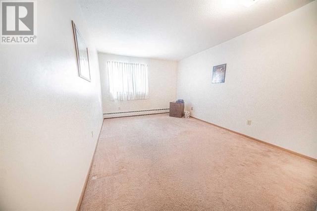106, - 5120 62 Street, Condo with 1 bedrooms, 1 bathrooms and 1 parking in Red Deer AB | Image 4