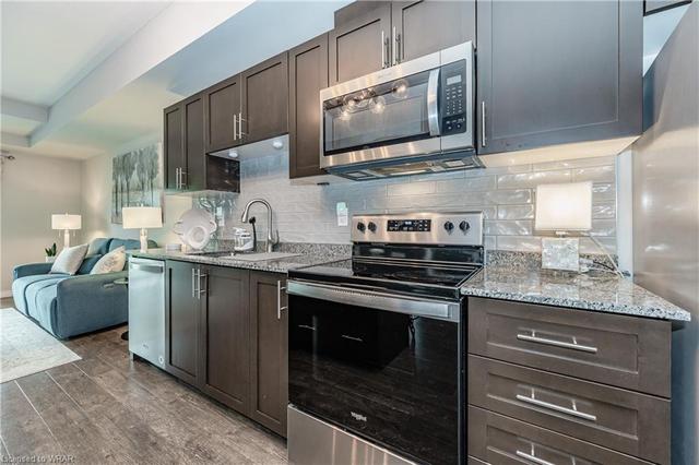 308 - 35 Kingsbury Square, House attached with 2 bedrooms, 2 bathrooms and 1 parking in Guelph ON | Image 23
