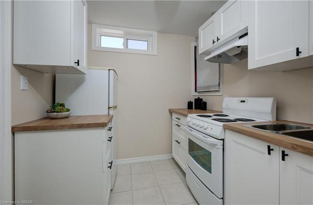 In the basement you’ll discover a fully-equipped 1-bed studio suite with kitchen and large, updated 3-pc bathroom, offering an ideal in-law setup or potential rental opportunity. | Image 11