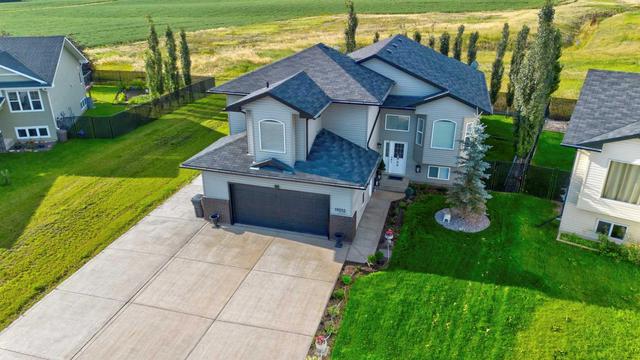 10212 93 Avenue, House detached with 5 bedrooms, 3 bathrooms and 6 parking in Sexsmith AB | Image 2