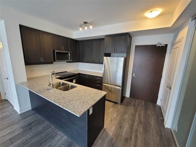 226 - 1050 Main St, Condo with 2 bedrooms, 2 bathrooms and 1 parking in Milton ON | Image 2