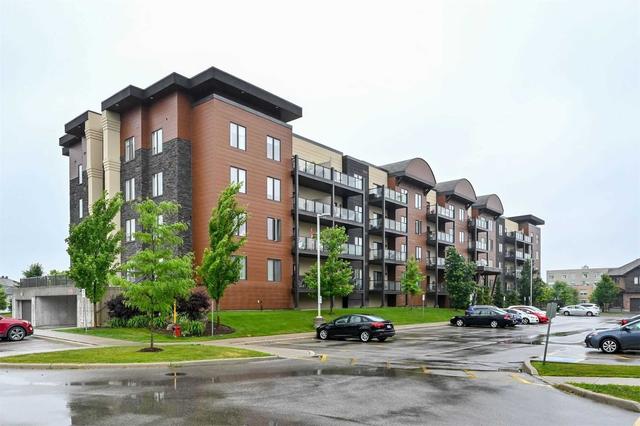 411 - 100 Dean Ave, Condo with 2 bedrooms, 2 bathrooms and 1 parking in Barrie ON | Image 1