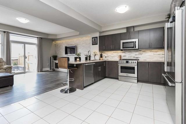 69 Fairgrounds Dr, House attached with 3 bedrooms, 3 bathrooms and 3 parking in Hamilton ON | Image 39