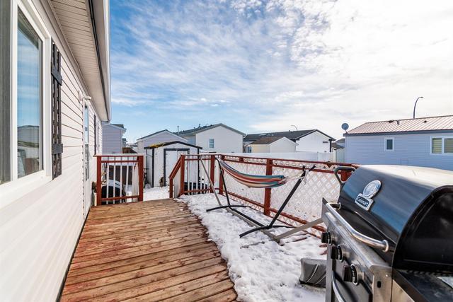 6 Meadowplace Crescent E, Home with 3 bedrooms, 2 bathrooms and 2 parking in Brooks AB | Image 14