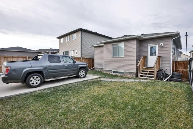 632 Aquitania Boulevard W, House detached with 5 bedrooms, 4 bathrooms and 3 parking in Lethbridge AB | Image 3