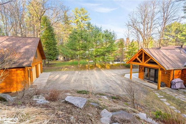 Double+ heated, insulated log garage space | Image 39