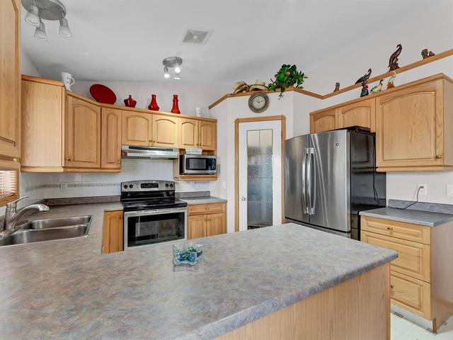 52 Storrs Crescent Se, House detached with 4 bedrooms, 3 bathrooms and 2 parking in Medicine Hat AB | Image 14