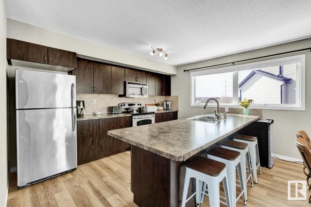 13 - 11 Clover Bar Ln, House attached with 3 bedrooms, 2 bathrooms and 2 parking in Edmonton AB | Image 2
