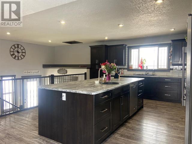 225041 690, House detached with 5 bedrooms, 3 bathrooms and 15 parking in Northern Lights County AB | Image 10