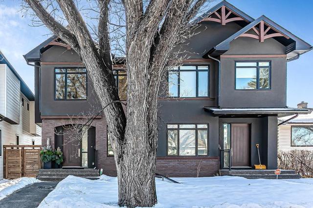 2913 6 Avenue Nw, Home with 4 bedrooms, 3 bathrooms and 4 parking in Calgary AB | Image 2