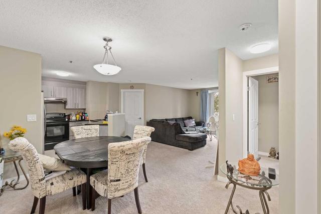 2105 - 2280 68 Street Ne, Condo with 2 bedrooms, 2 bathrooms and 1 parking in Calgary AB | Image 2
