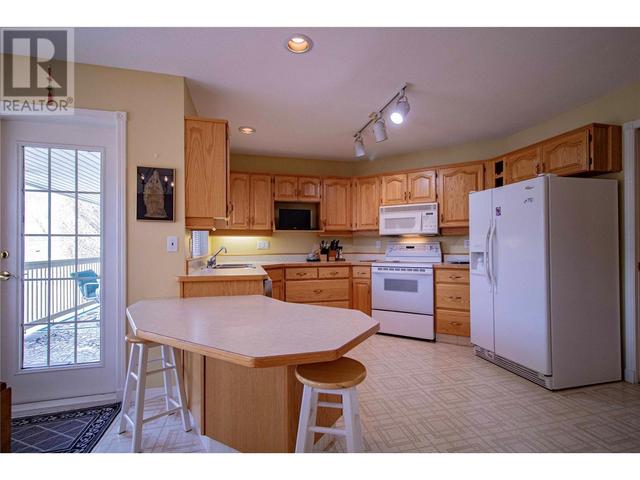 240 - 805 Comox Street, House attached with 2 bedrooms, 2 bathrooms and 2 parking in Penticton BC | Image 14