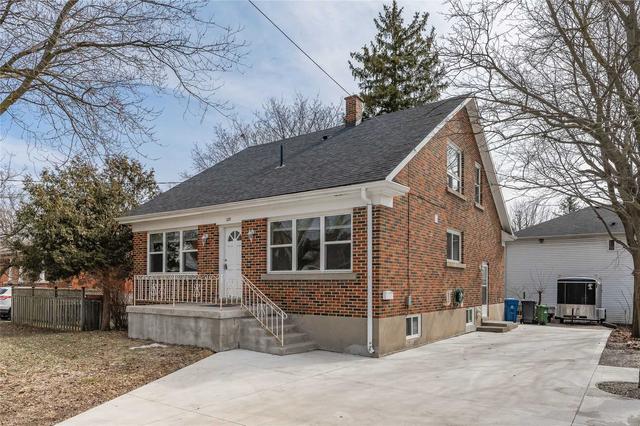 225 Elizabeth St, House detached with 5 bedrooms, 3 bathrooms and 5 parking in Guelph ON | Image 1