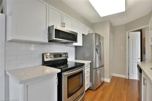 503 - 100 Millside Dr, Condo with 2 bedrooms, 2 bathrooms and 1 parking in Milton ON | Image 25