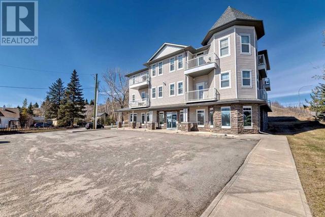307, - 144 Crescent Road W, Condo with 2 bedrooms, 2 bathrooms and 2 parking in Okotoks AB | Image 3