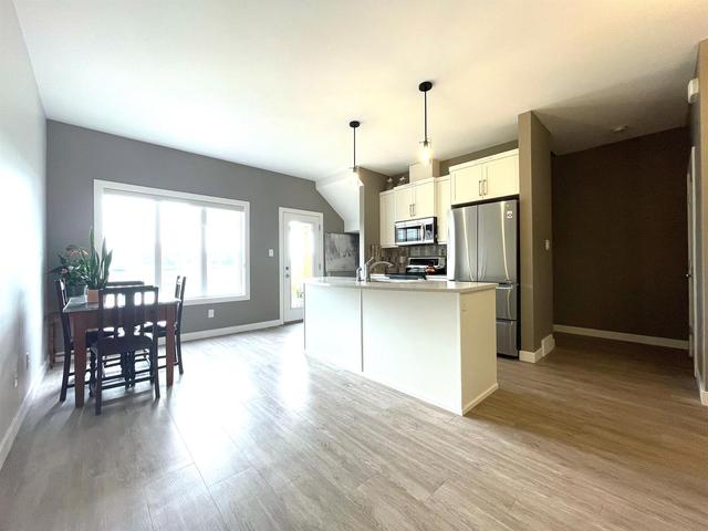3 - 1576 Stafford Drive N, Home with 2 bedrooms, 3 bathrooms and 2 parking in Lethbridge AB | Image 7