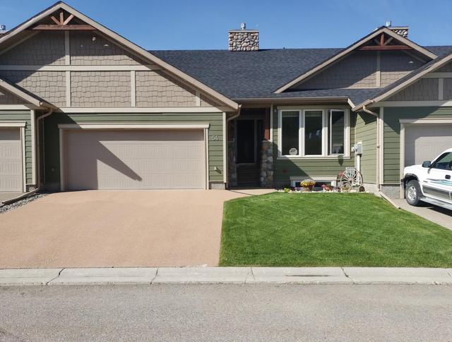54 Ironstone Drive, Home with 3 bedrooms, 2 bathrooms and 2 parking in Crowsnest Pass AB | Image 1
