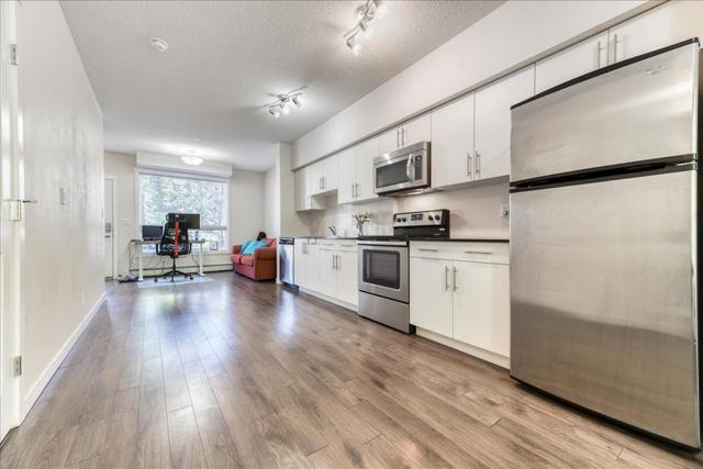 102 - 1740 9 Street Nw, Home with 2 bedrooms, 1 bathrooms and 1 parking in Calgary AB | Image 12