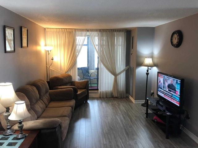 1211 - 25 Kensington Rd, Condo with 2 bedrooms, 2 bathrooms and 1 parking in Brampton ON | Image 6