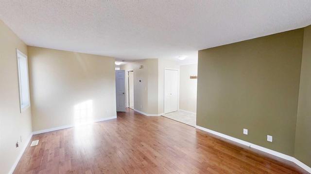 6301 90 Street, Home with 4 bedrooms, 1 bathrooms and null parking in Grande Prairie AB | Image 3