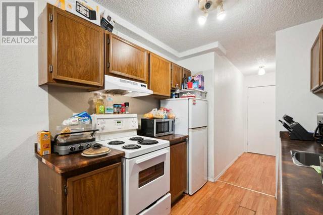 101, - 1113 37 Street Sw, Condo with 1 bedrooms, 1 bathrooms and 1 parking in Calgary AB | Image 3