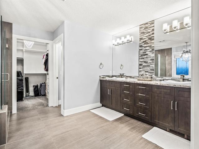 152 Kinniburgh Circle, House detached with 6 bedrooms, 3 bathrooms and 4 parking in Calgary AB | Image 30