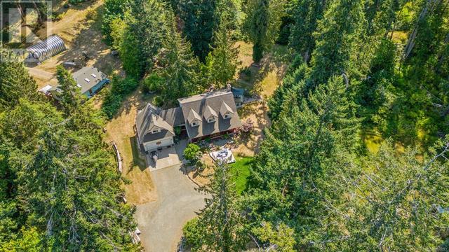 6249 Island Hwy, House detached with 3 bedrooms, 3 bathrooms and 8 parking in Comox Valley A BC | Image 79