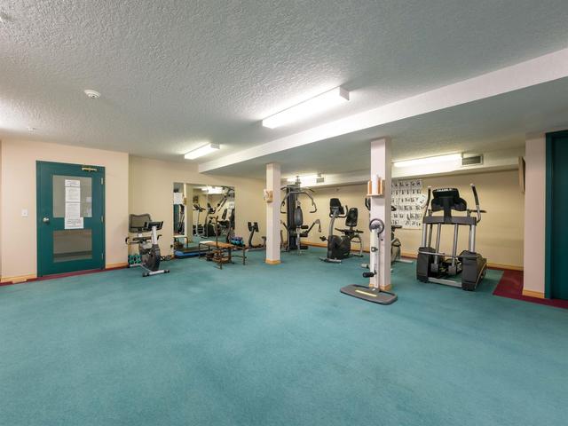 124 - 7229 Sierra Morena Boulevard Sw, Condo with 2 bedrooms, 2 bathrooms and 1 parking in Calgary AB | Image 23