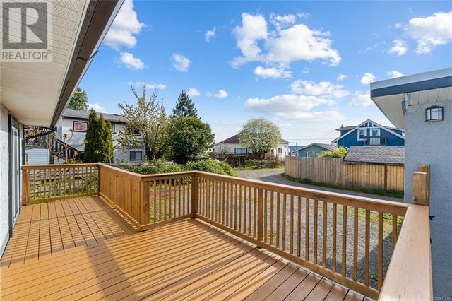 Main deck with access off the primary bedroom into the backyard | Image 15