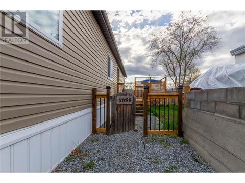 6688 Gibbs Road, House other with 3 bedrooms, 2 bathrooms and 4 parking in North Okanagan B BC | Card Image