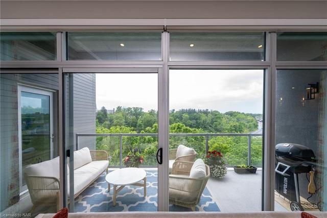Private terrace with picturesque views from above the tree line. | Image 15