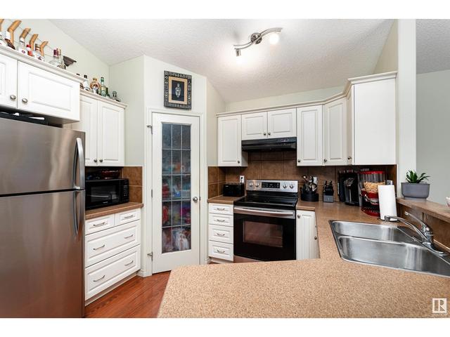9309 106 Av, House detached with 4 bedrooms, 2 bathrooms and null parking in Morinville AB | Image 11