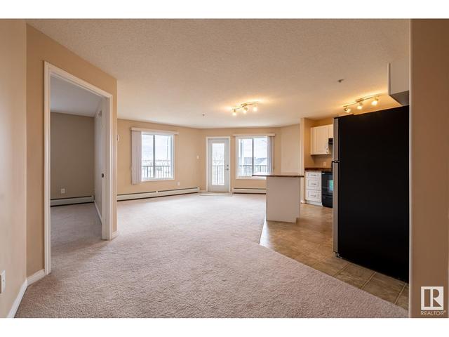 309 - 111 Edwards Dr Sw, Condo with 2 bedrooms, 2 bathrooms and 1 parking in Edmonton AB | Card Image