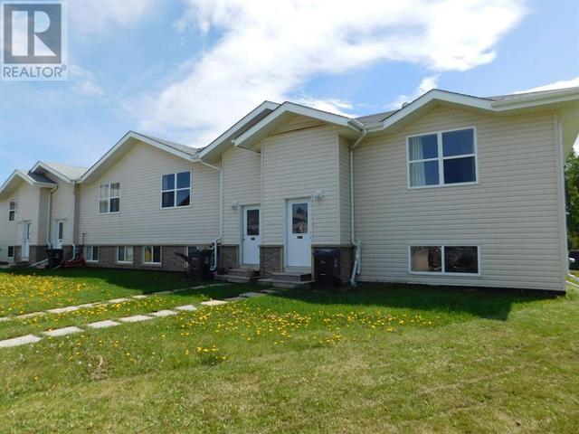 4919 - 59 Streetclose, House attached with 2 bedrooms, 1 bathrooms and 2 parking in Rocky Mountain House AB | Card Image