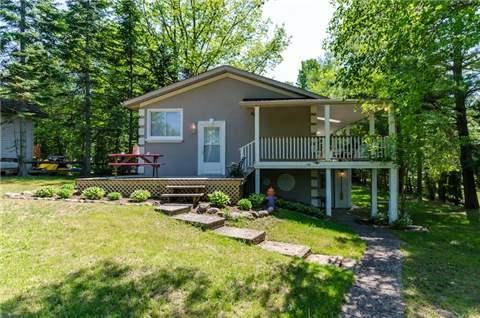 48 Zoo Park Rd, House detached with 2 bedrooms, 2 bathrooms and 4 parking in Wasaga Beach ON | Image 1