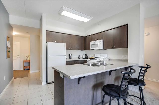 210 - 1083 Gordon St, Condo with 3 bedrooms, 2 bathrooms and 1 parking in Guelph ON | Image 13