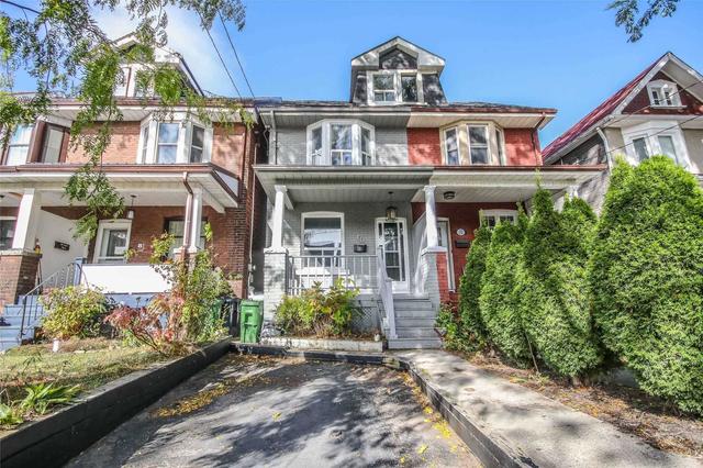 10 Strathmore Blvd, House semidetached with 4 bedrooms, 2 bathrooms and 1 parking in Toronto ON | Image 1