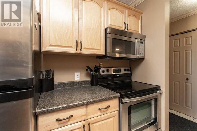 302, - 4722 44 Street, Condo with 2 bedrooms, 1 bathrooms and 1 parking in Sylvan Lake AB | Image 4