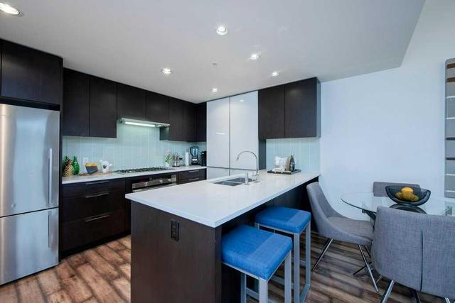 1106 12 Avenue Sw, Home with 2 bedrooms, 2 bathrooms and 2 parking in Calgary AB | Image 11