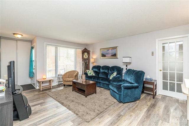 100 - 1725 Marsala Crescent, House attached with 2 bedrooms, 1 bathrooms and 2 parking in Ottawa ON | Image 7