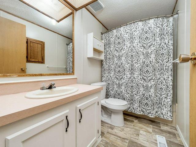 66 - 2715 Westside Drive W, Home with 3 bedrooms, 2 bathrooms and 2 parking in Lethbridge AB | Image 5