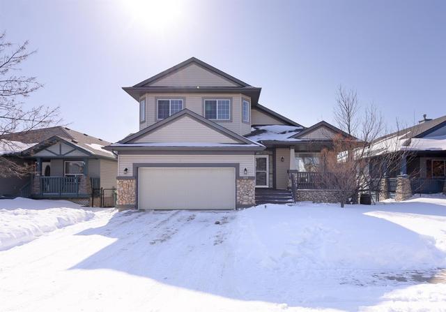 129 West Creek Pond, House detached with 3 bedrooms, 3 bathrooms and 4 parking in Calgary AB | Image 1