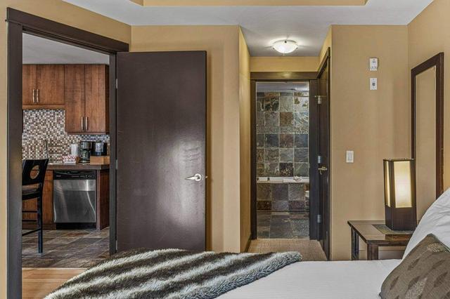 217 rot c - 1818 Mountain Avenue, Condo with 2 bedrooms, 2 bathrooms and 1 parking in Kananaskis AB | Image 10