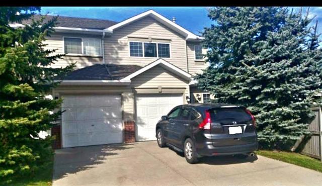 16 Millrise Green Sw, Home with 2 bedrooms, 1 bathrooms and 2 parking in Calgary AB | Image 1