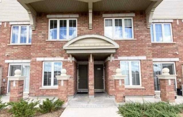 03 - 2500 Post Rd, Townhouse with 2 bedrooms, 2 bathrooms and 1 parking in Oakville ON | Image 1