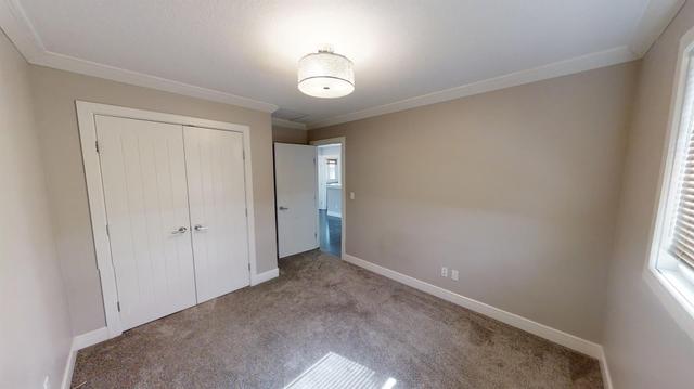 9001 80a Avenue, House detached with 5 bedrooms, 3 bathrooms and 4 parking in Grande Prairie AB | Image 12