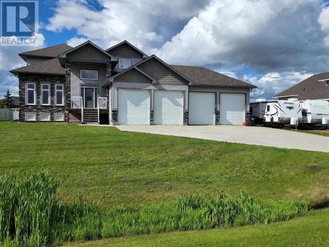 7710 Oxford Road, House detached with 4 bedrooms, 3 bathrooms and 5 parking in Grande Prairie County No. 1 AB | Image 1